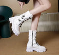 Women's black mid-calf knight boots with side zipper and metal buckle on artificial PU upper