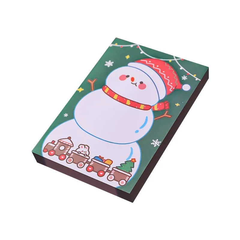 Christmas sticky notes book showing cartoon designs of Elf, Gift, Sled, Ball, Santa, House, Bear, and Snowman