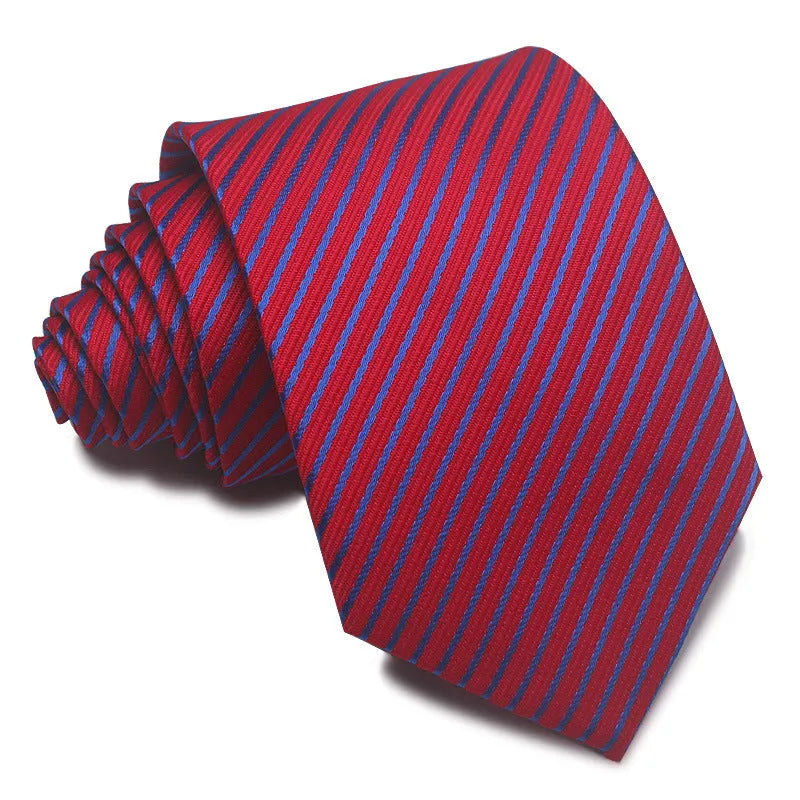Close-up of a red, black, and blue striped men's formal tie with a textured Jacquard weave.