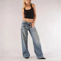 Women's blue loose straight wide leg cotton trousers with low waist and stitching detail