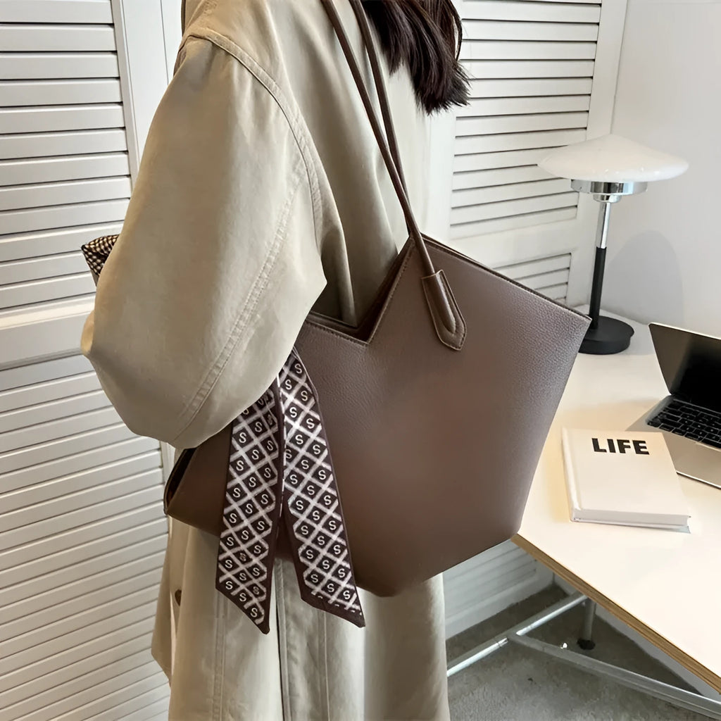 Women's large capacity shoulder bag in horizontal square shape showing black and brown colour options