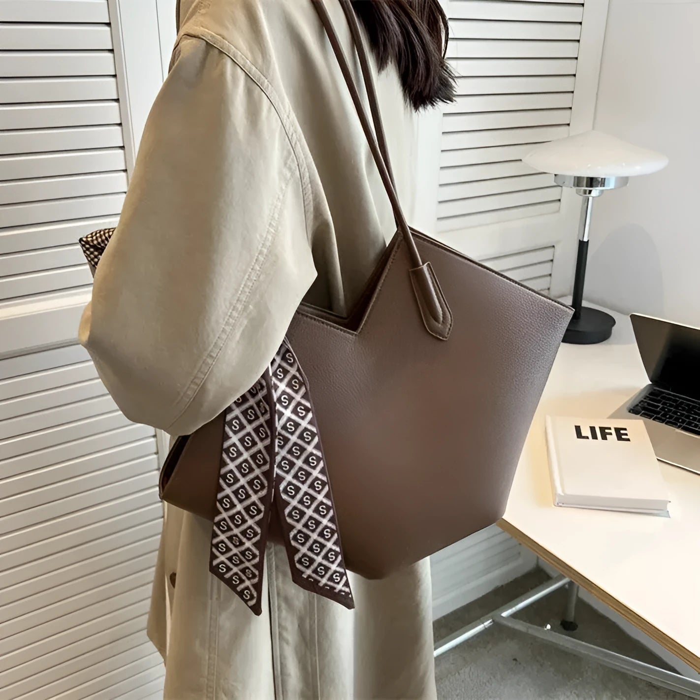 Women's large capacity shoulder bag in horizontal square shape showing black and brown colour options