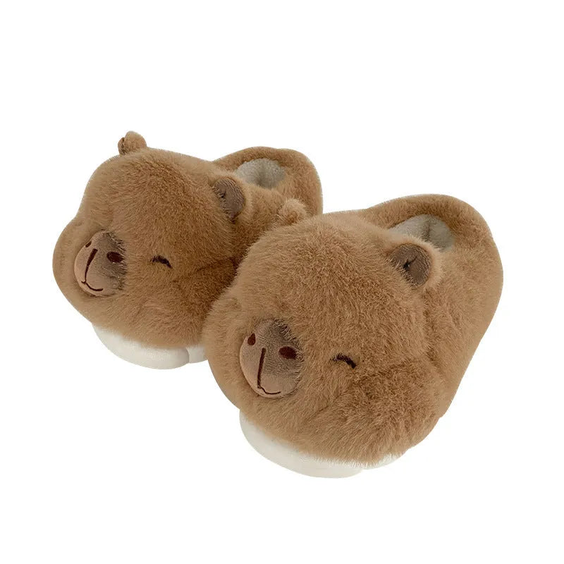 Light brown plush women's winter slippers with artificial wool lining and a round toe.