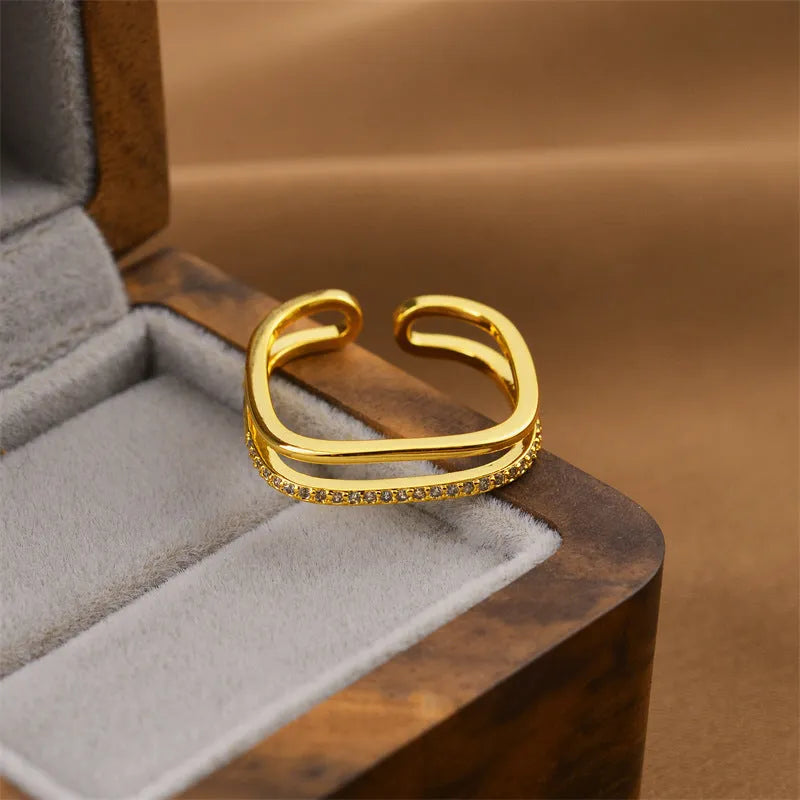 Korean fashion women's geometric open ring with electroplated gold finish on copper