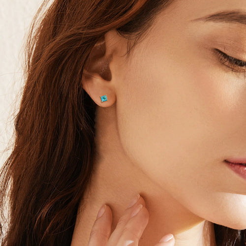 Brass gold-plated drop-shaped zircon earrings with pear silhouette on copper base