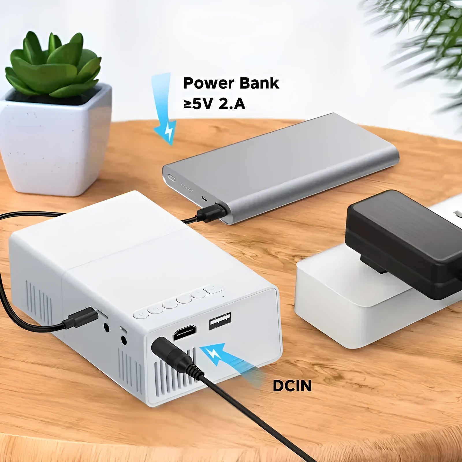 M100 mini portable LED projector in black or white with remote control and cables