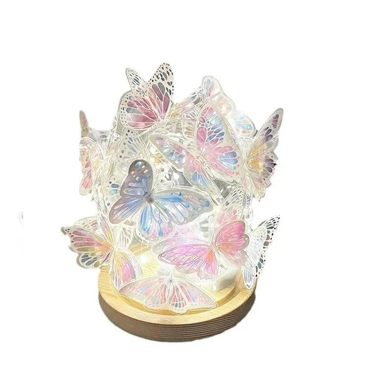 Butterfly-themed small night lamp with glass shade and raw wood base, 12x15 cm.