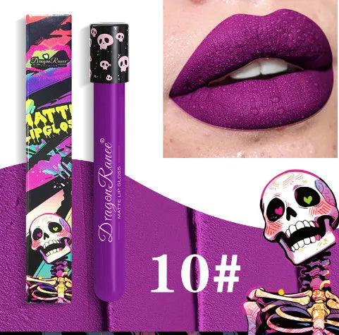 Halloween creative makeup lip gloss in skull-shaped test tube packaging, showing a matte gold and silver finish.