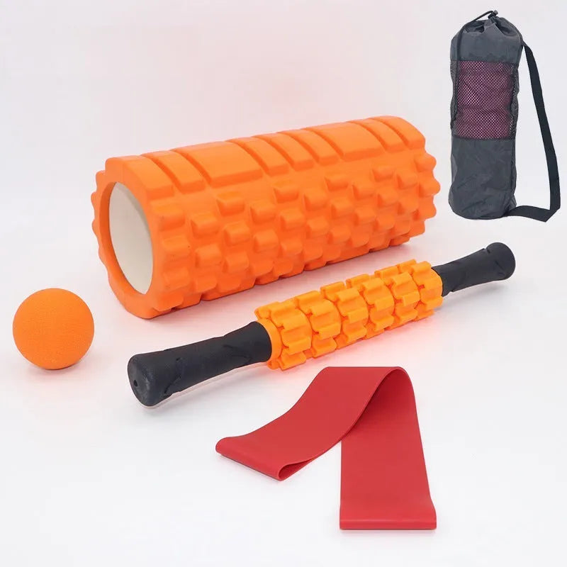 Black 33cm fitness foam roller with six gear massage bar pieces on grey background