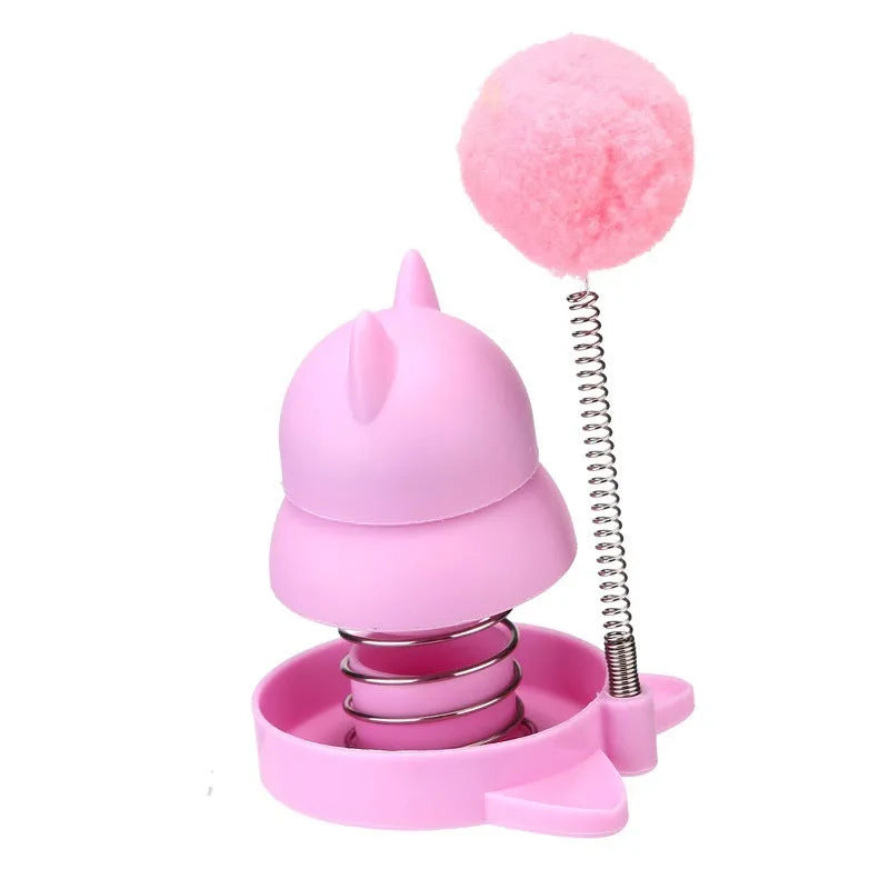 Lucky cat licking mint ball cat toy in blue, orange, and pink colours measuring 55mm diameter