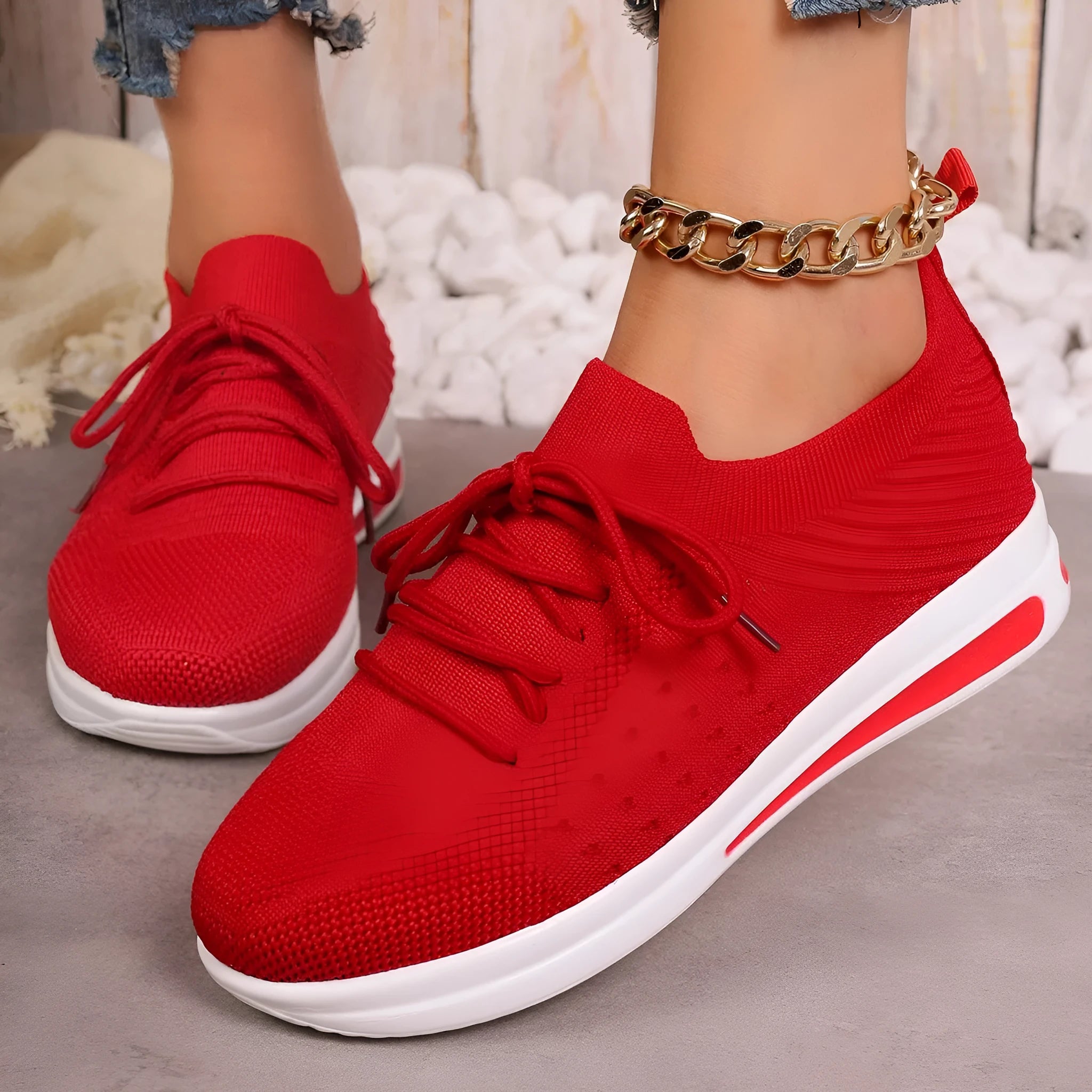 Women's fly-knit casual sneakers in black blue and red with artificial PU upper and low top design