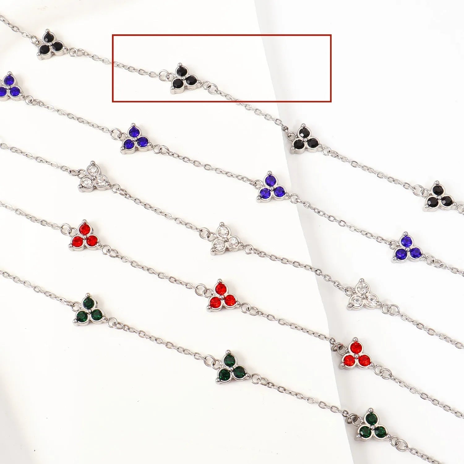 Women's geometric bracelet with triangular diamond cluster in gold or steel stainless steel with coloured stones
