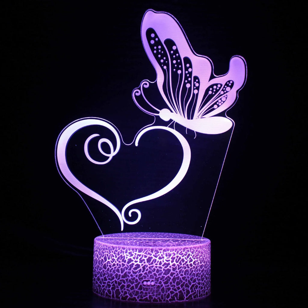 Small colourful USB table lamp with 3D acrylic crack-effect base and touch control on a wooden desk.