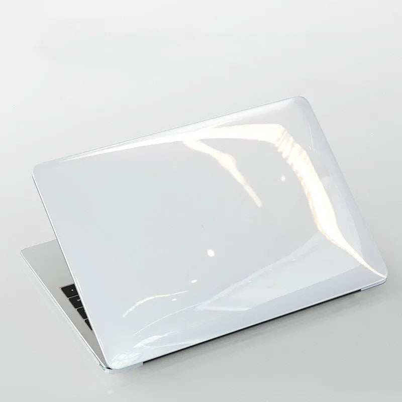 Transparent and black PC hard shell protective cases for MacBook Pro 14 inch and 16 inch laptops.