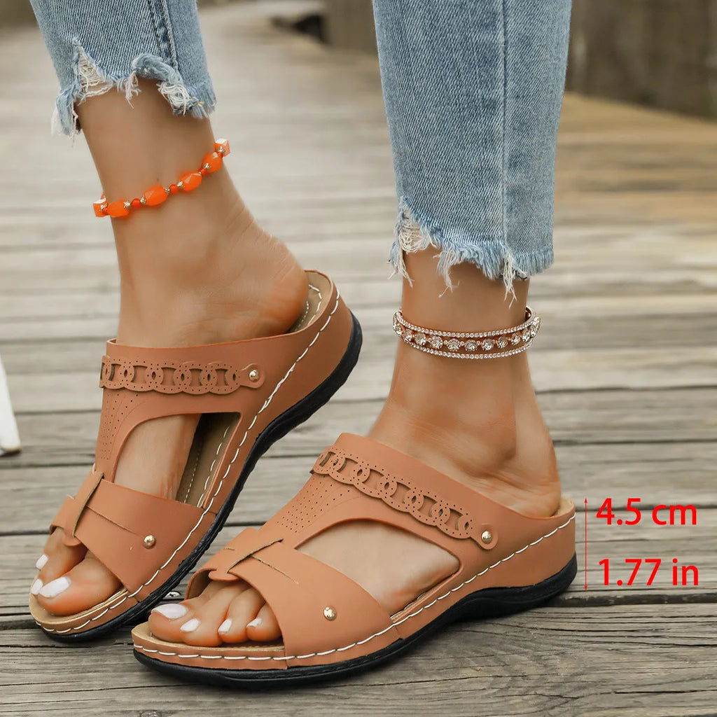 Women's Roman style slippers with slope heel and fish mouth toe design in PU upper and rubber sole