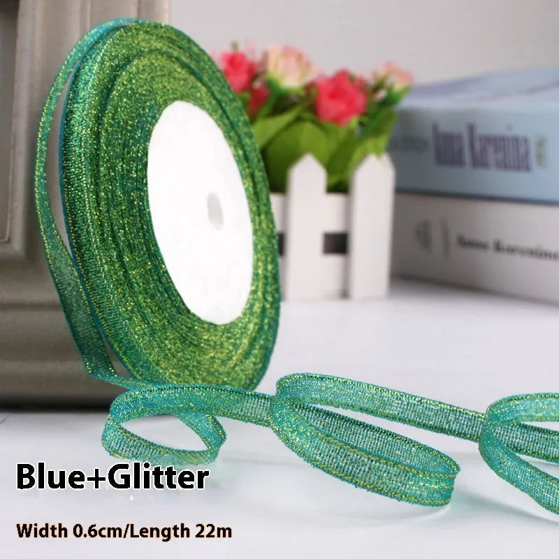 Roll of narrow 0.6cm wide polyester satin ribbon in a choice of colours, showing 22 metre length.