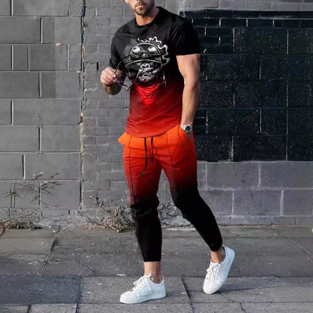 Man wearing a printed short-sleeve t-shirt and matching trousers from a cotton-like men's tracksuit set.
