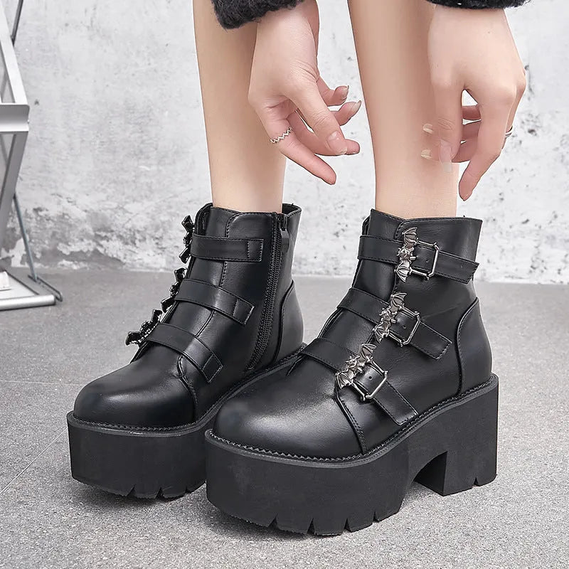 Black women's platform ankle boots with bat buckle Gothic detailing and side zipper