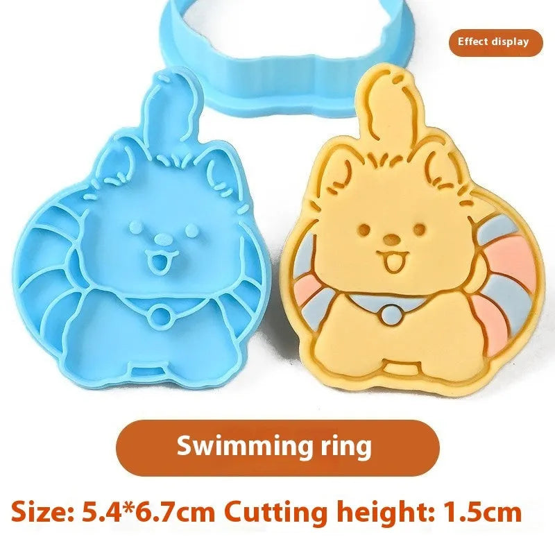 Plastic biscuit mould showing three-dimensional puppy head design with birthday hat for baking