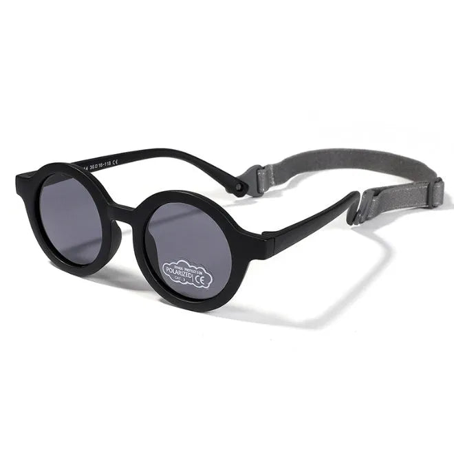 Children's silicone sunglasses with round frame and polarised lenses in multiple colours for 0-3 year olds