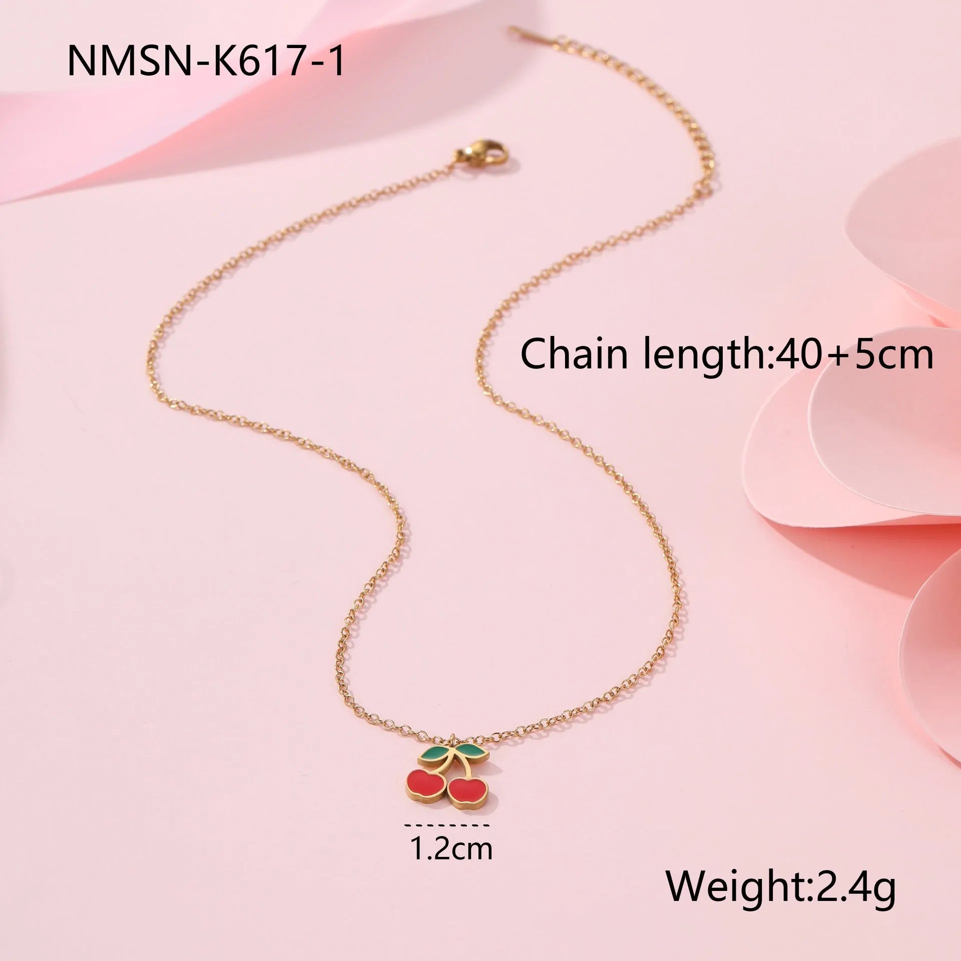 Cherry jewellery set with stainless steel necklace, bracelet, earrings, and ring featuring geometric shapes and 18K plating