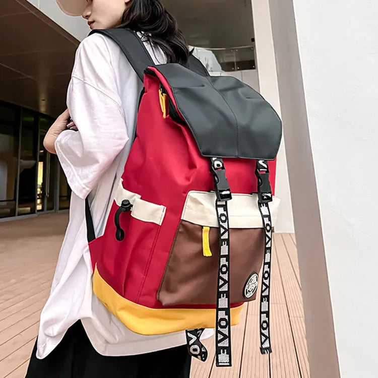 Oxford cloth backpack shown in black, green, or red, featuring multiple carry handles and straps.