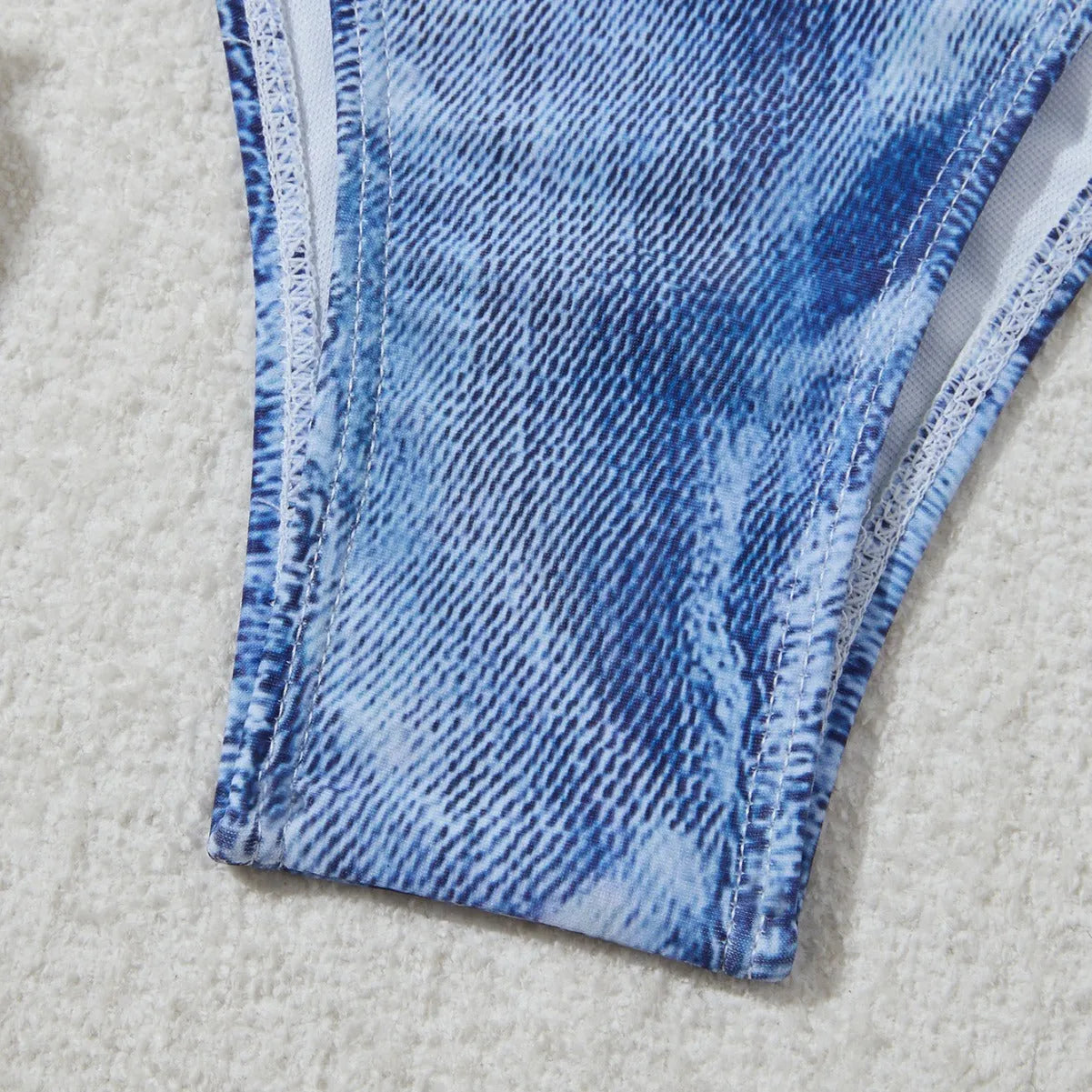 Women's denim blue printed bikini set with strap design showing front and back views