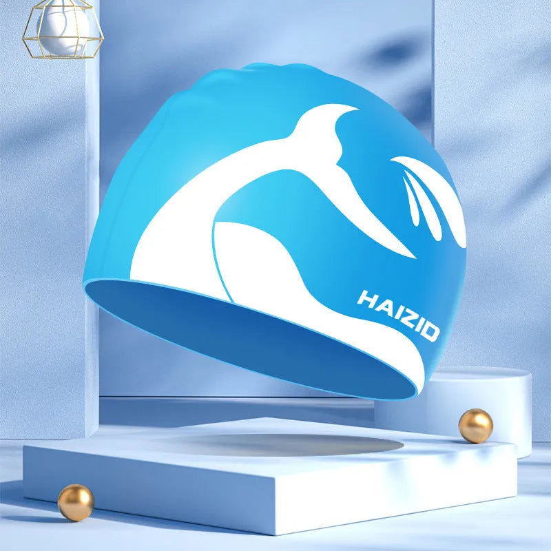 Silicone swimming cap with whale tail design and waterproof ear protectors in multiple colour options