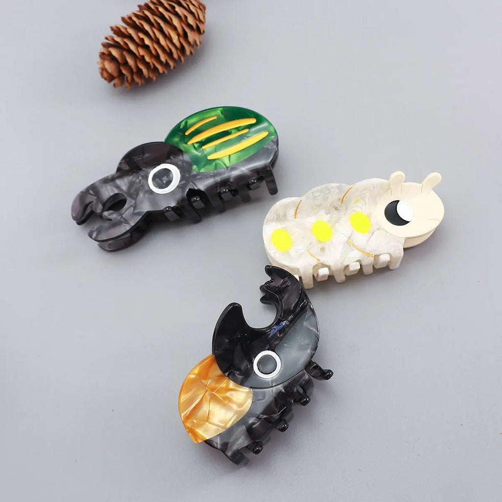 Handmade cellulose acetate beetle grip decorative clip with insect biology cartoon design