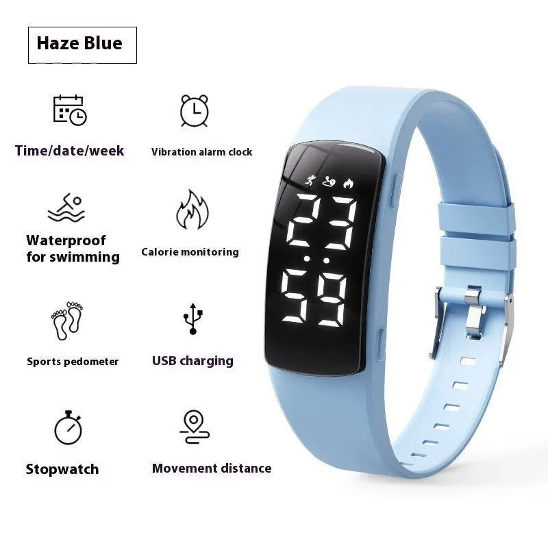 Black vibration alarm smart watch with LED display and silicone strap on a wrist.
