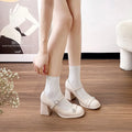 Women's black patent leather chunky heel round toe shoes with buckle strap