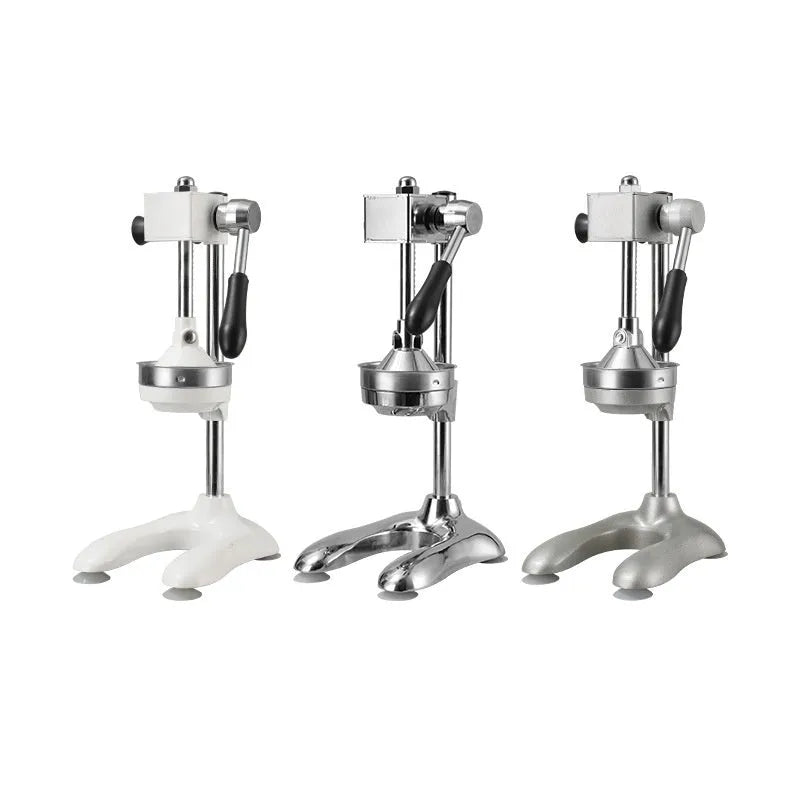 Stainless steel manual vertical juicer on a countertop, showing options for black, silver, orange, white, and electroplated finishes with pointed, flat, and double head tips.