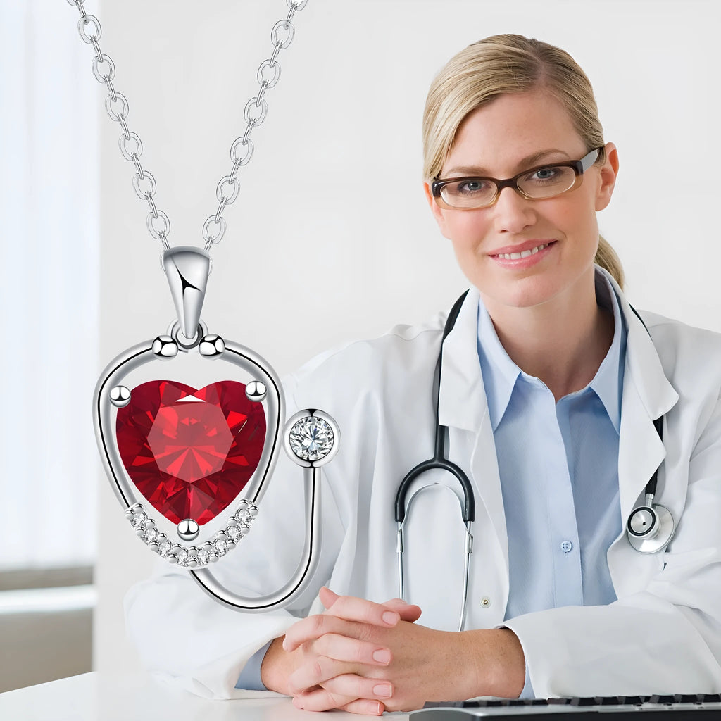 Women's fashion necklace with stethoscope, wings, and cross design in red diamond electroplated copper