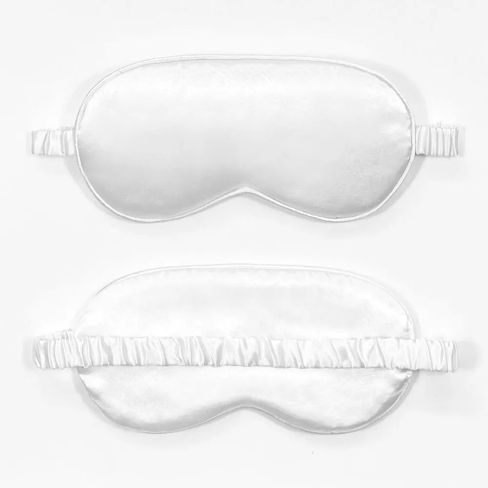 Double-sided Rayon elastic satin sleep mask shown in multiple colour options including sky blue, black, wine red, and light pink.