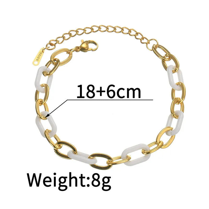 Women's stainless steel bracelet with a double-layered resin heart shape and electroplated finish.