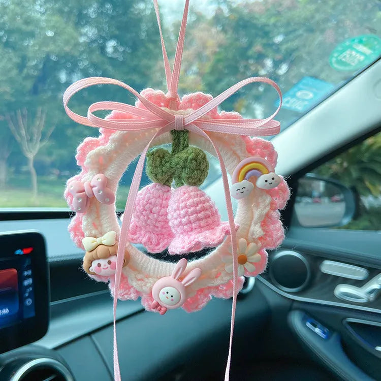 Woven wool bell orchid car pendant in green, pink, purple, or yellow with optional dream catcher.