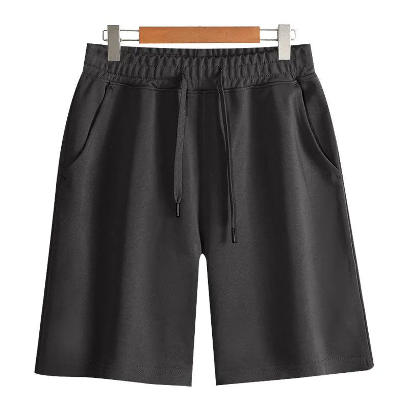 Straight leg cotton sports shorts in light grey on a neutral background.