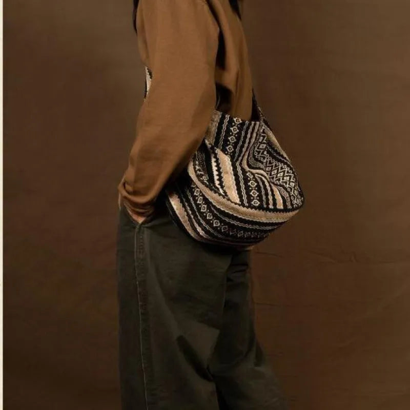Corduroy vintage messenger bag with jacquard stripe pattern and adjustable plaid shoulder strap