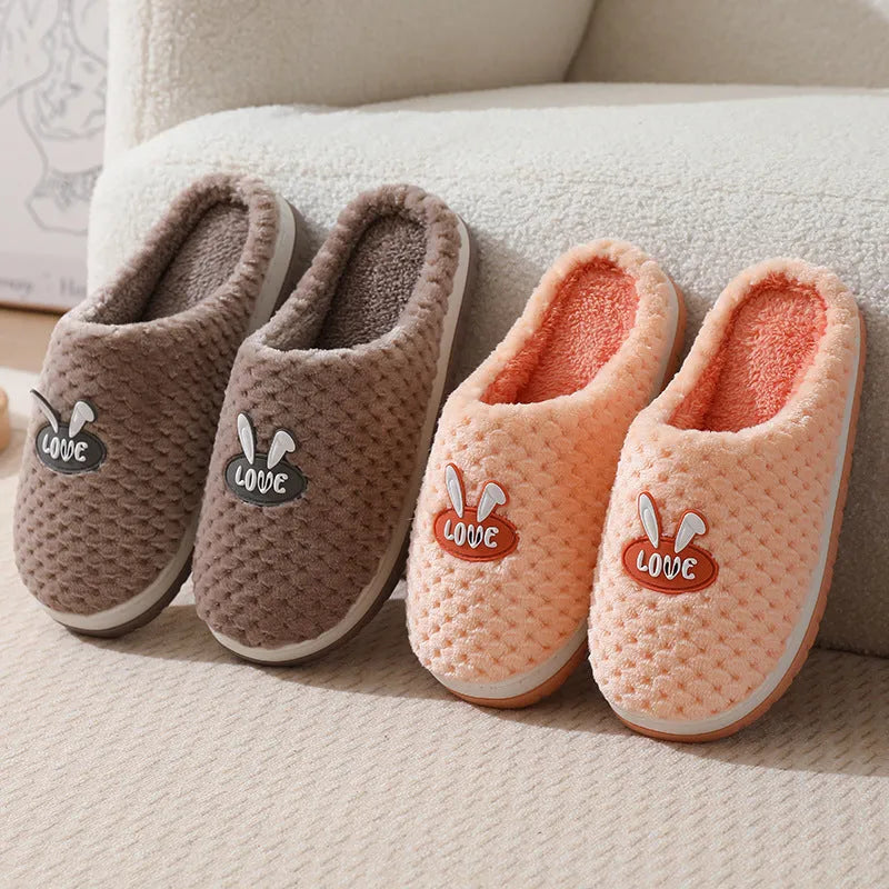 Women's rabbit plaid artificial fur house slippers with a thick rubber sole in five colour options.