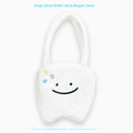 White plush large tooth shoulder tote bag with crossbody strap and zipper closure
