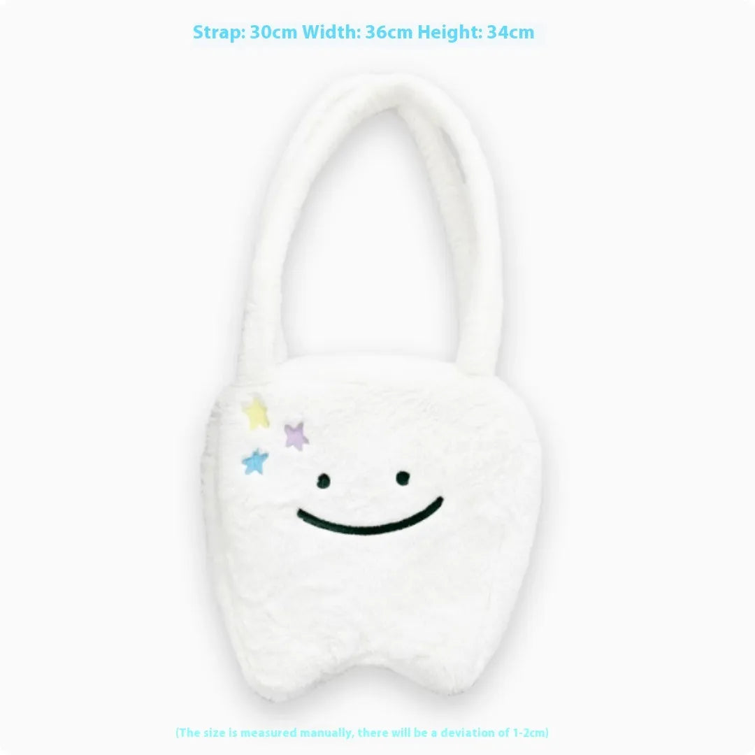 White plush large tooth shoulder tote bag with crossbody strap and zipper closure