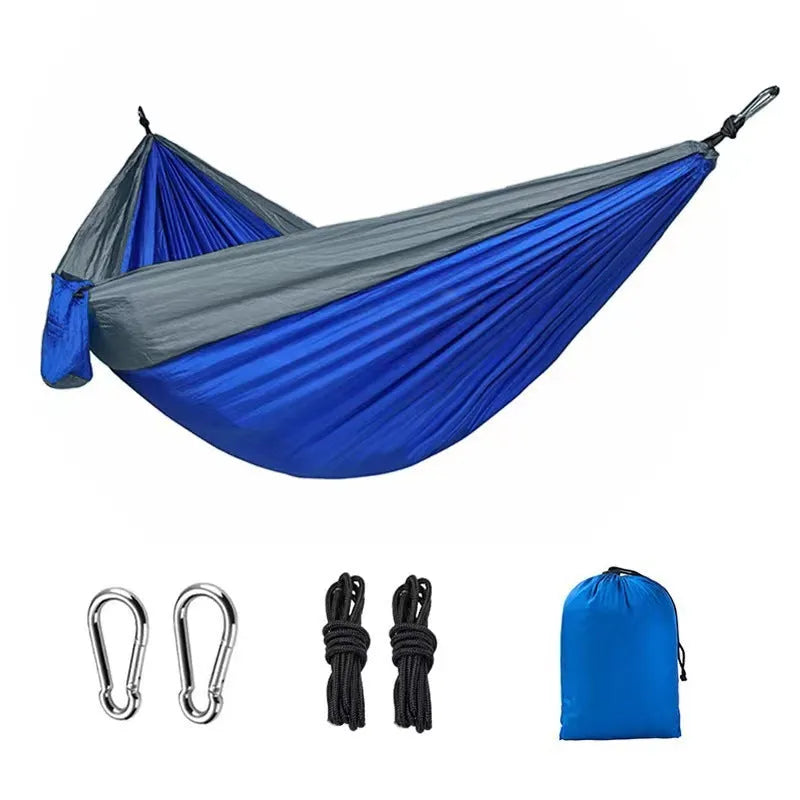 Outdoor nylon hammock in blue colour with reinforced stitching for camping and garden use
