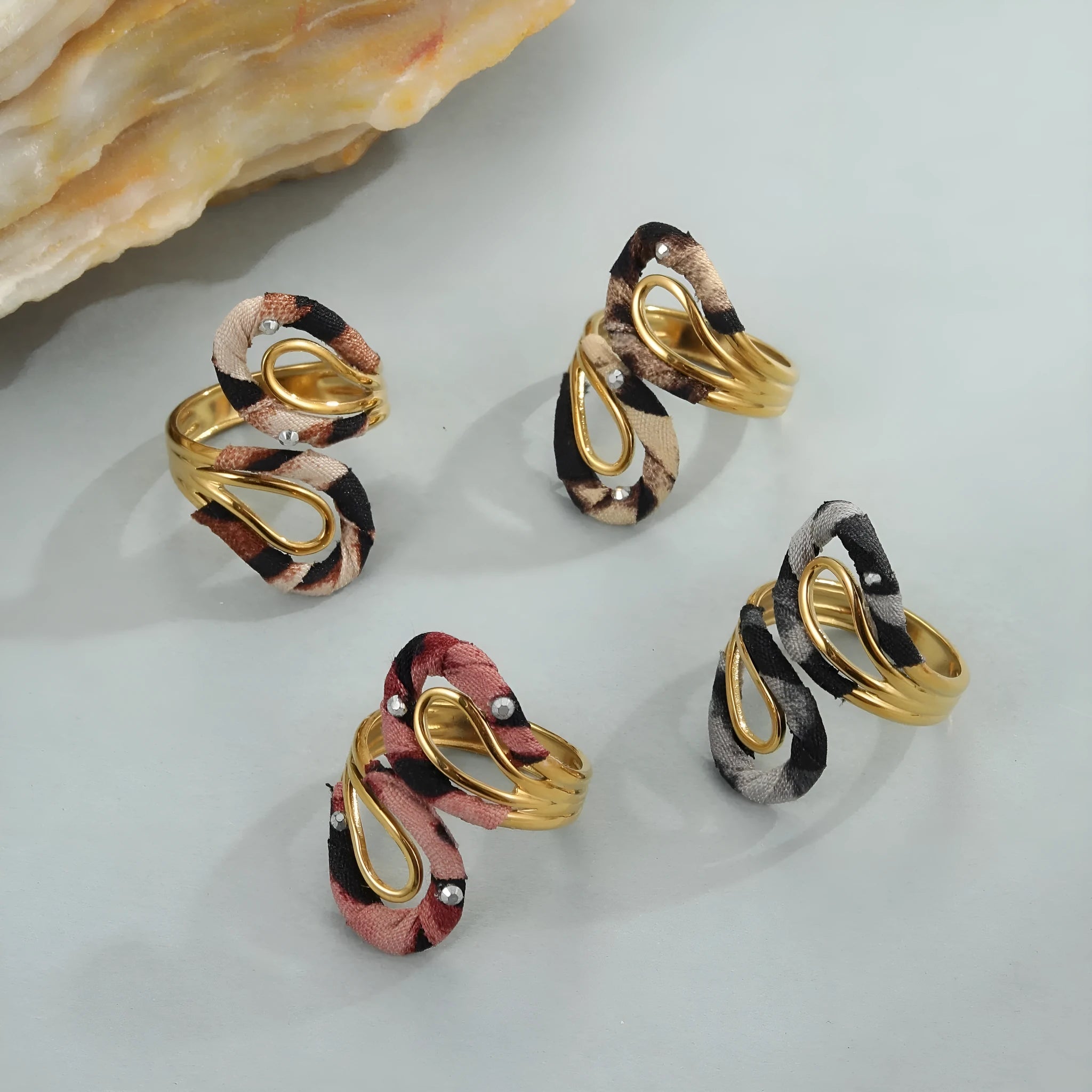 Geometric leopard print open mouth ring in stainless steel with heart shape design