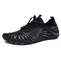 White lace-up casual sports shoes with a breathable inner and textured non-slip rubber outsole.