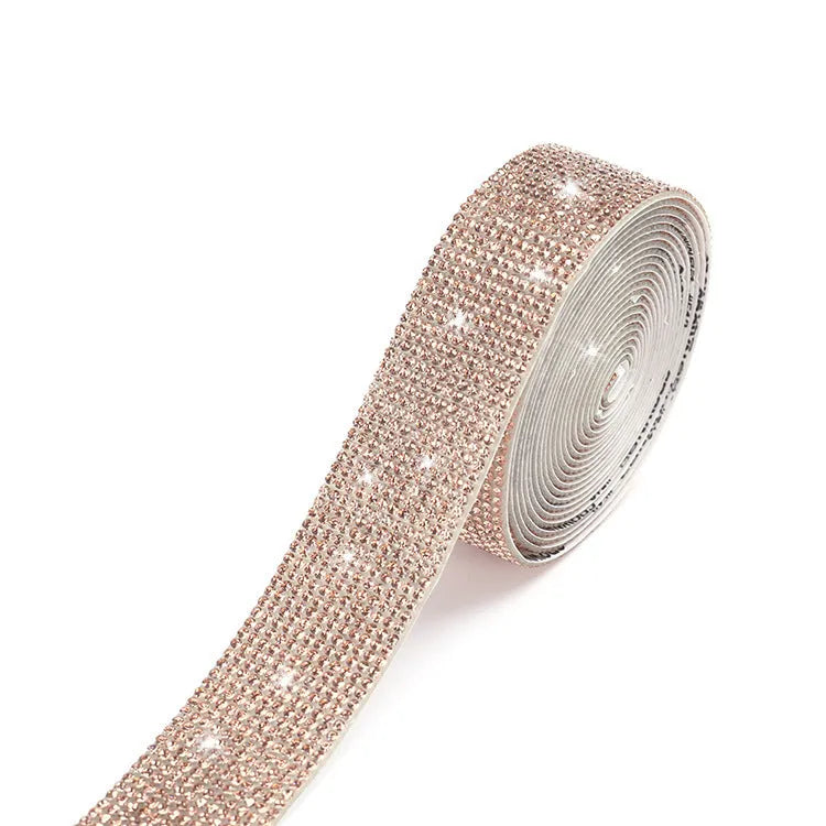 Self-adhesive glass water drill strip in AB colour and white showing electroplated finish