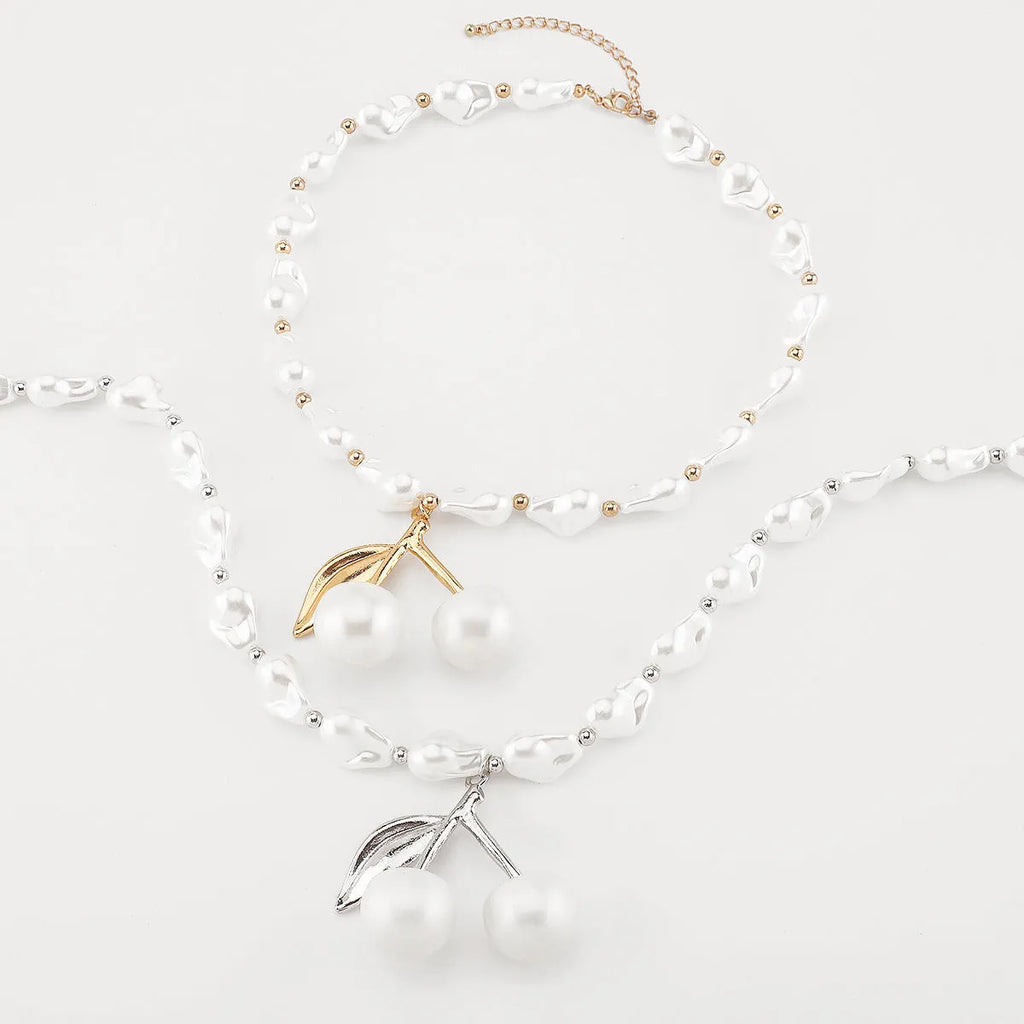 Gold geometric cherry fruit necklace with imitation pearls on adjustable chain for women