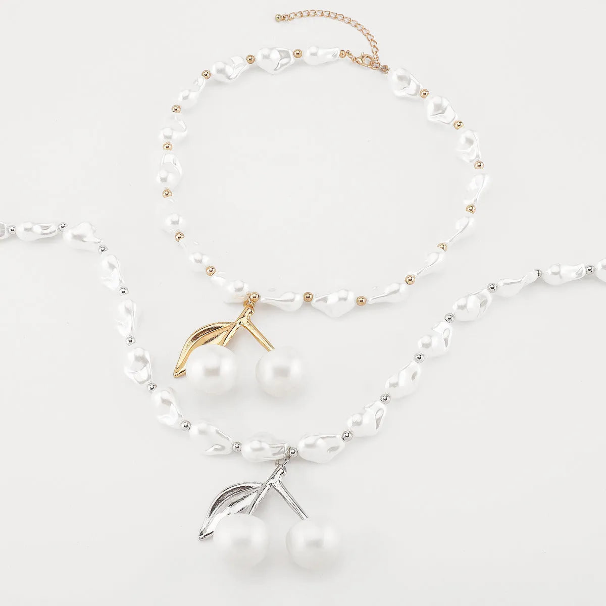 Gold geometric cherry fruit necklace with imitation pearls on adjustable chain for women