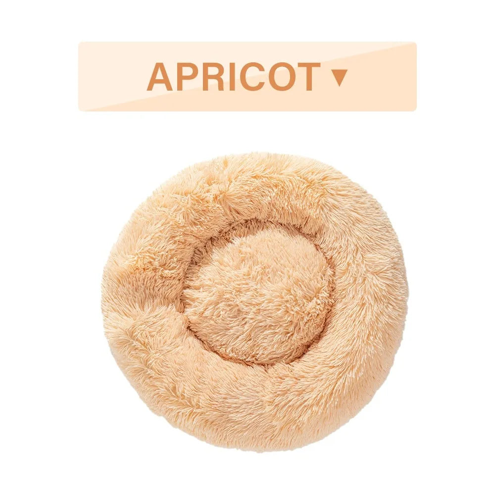 Donut-shaped long plush pet bed with raised sides, shown in a neutral colour.