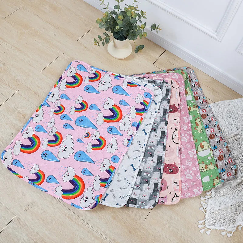 Reusable washable pet urine pad with colourful animal print and waterproof non-slip backing.