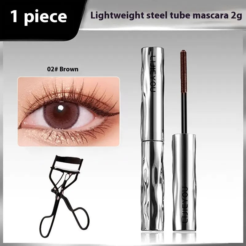Waterproof steel tube mascara with black or brown shades and optional eyelash curler